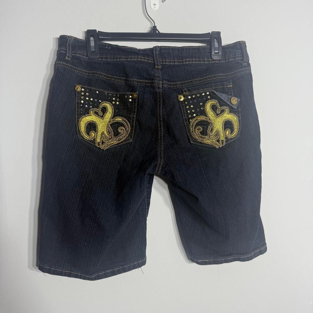 Southpole navy blue denim capri shorts with yellow accents and rhinestones. Size